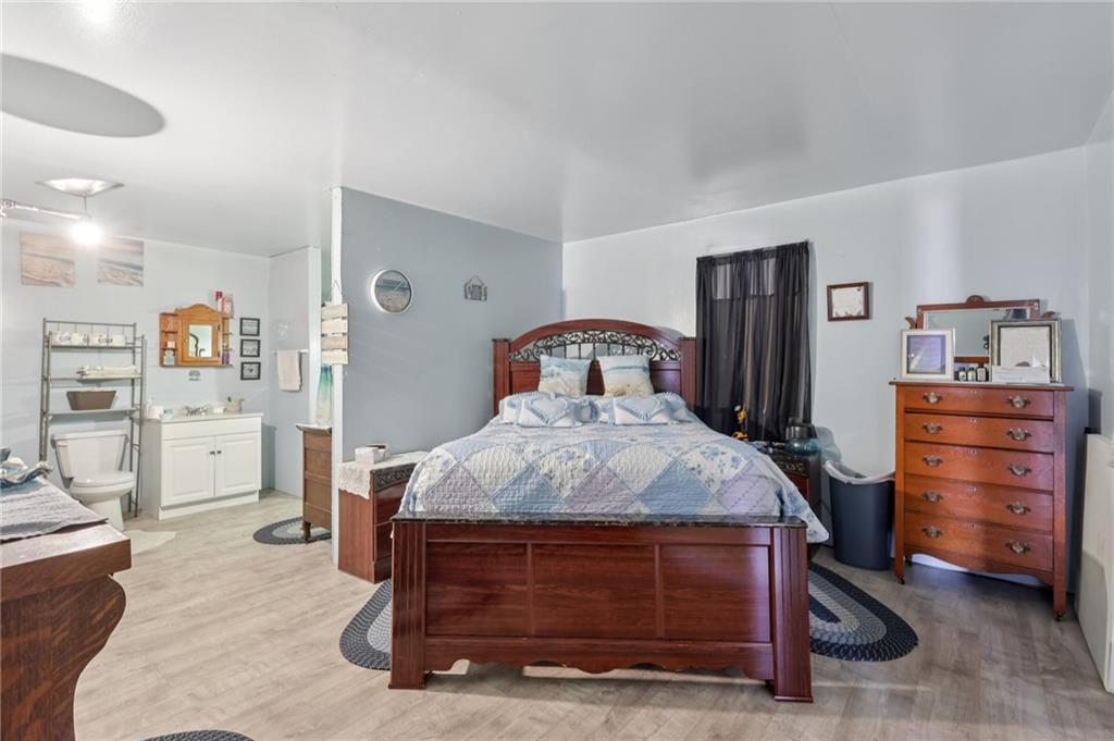 2753 Hemlock Lake Road Rossiter, PA 15772 - Photo 9 of 50 a bedroom with a bed and furniture