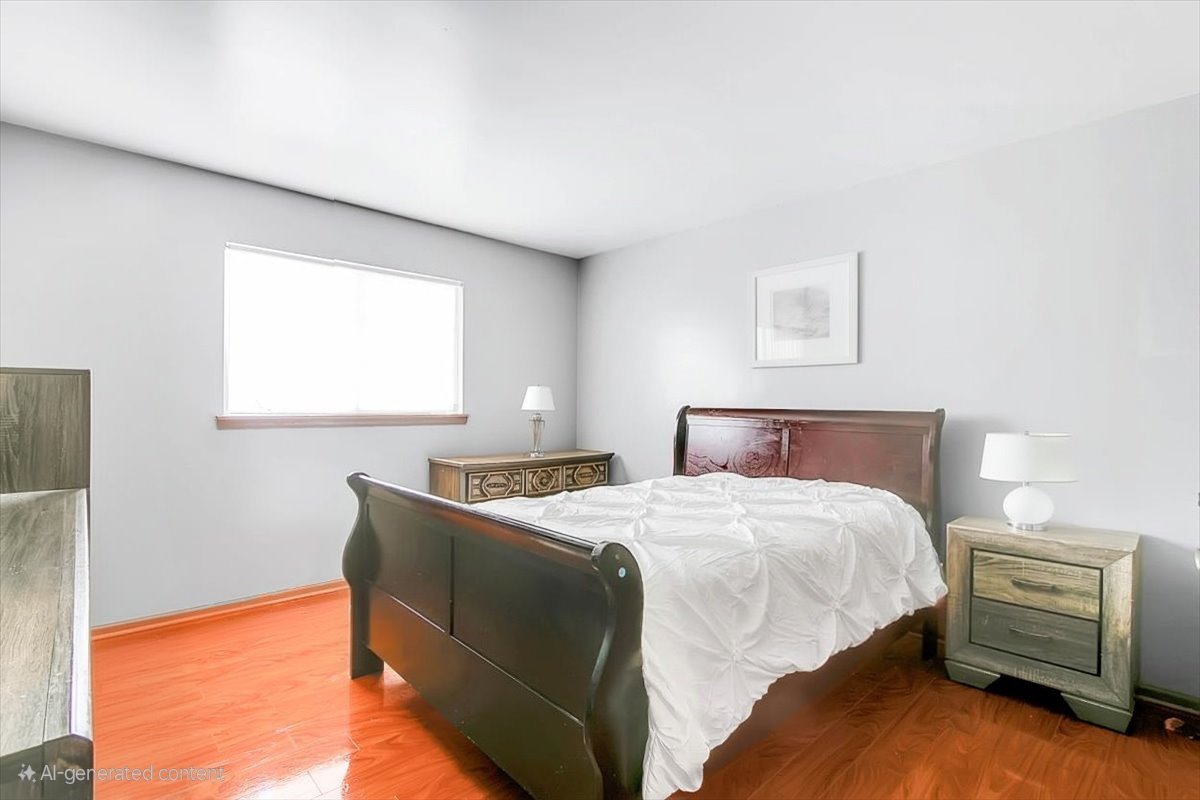 663 Primrose Lane Matteson, IL 60443 - Photo 16 of 32 a bedroom with a bed and a window