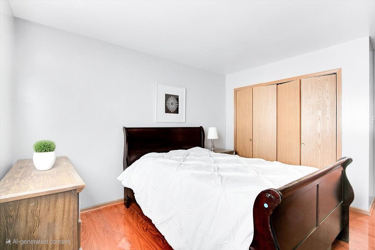 663 Primrose Lane Matteson, IL 60443 - Photo 17 of 32 a bedroom with a bed and window