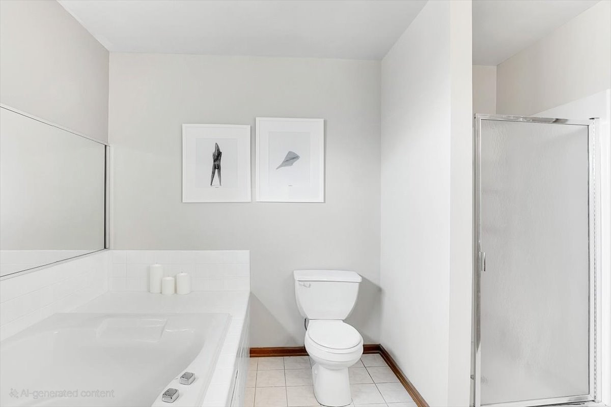 663 Primrose Lane Matteson, IL 60443 - Photo 21 of 32 a bathroom with a toilet and a bathtub