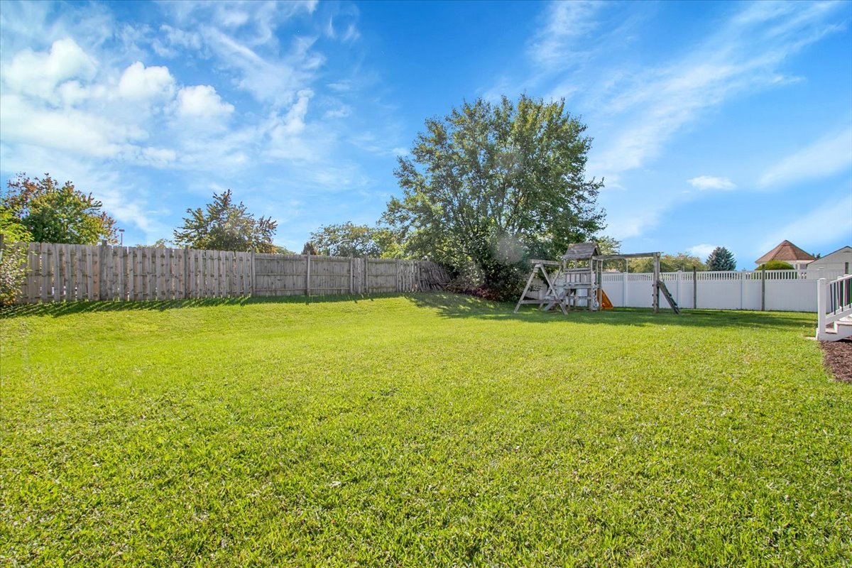 663 Primrose Lane Matteson, IL 60443 - Photo 29 of 32 a view of an outdoor space and swimming pool