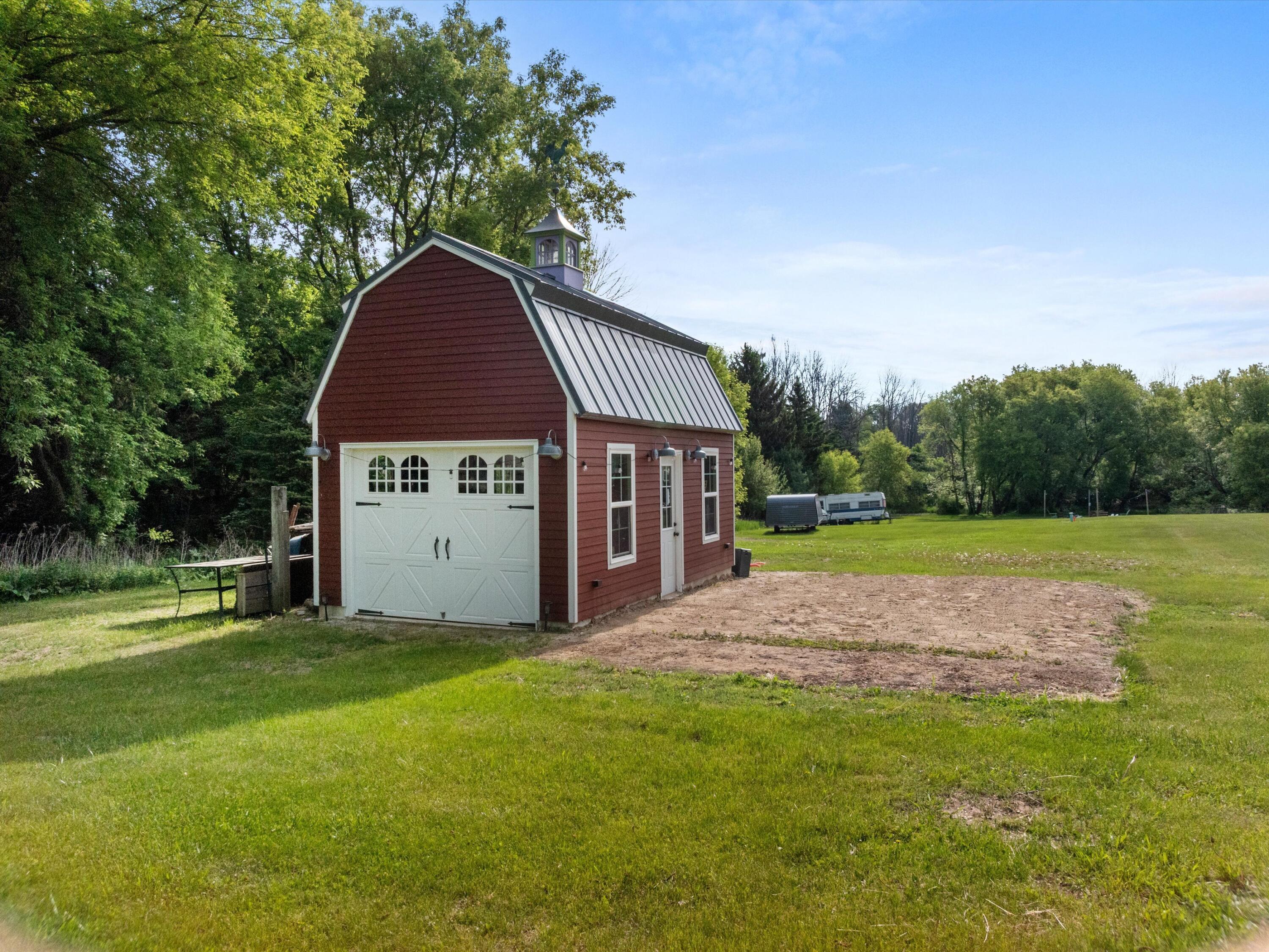 3127 South 15th Street Manitowoc, WI 54220 - Photo 3 of 27 12X 20 Outbuilding- Cement Floor/ Electricity/ Storage Loft