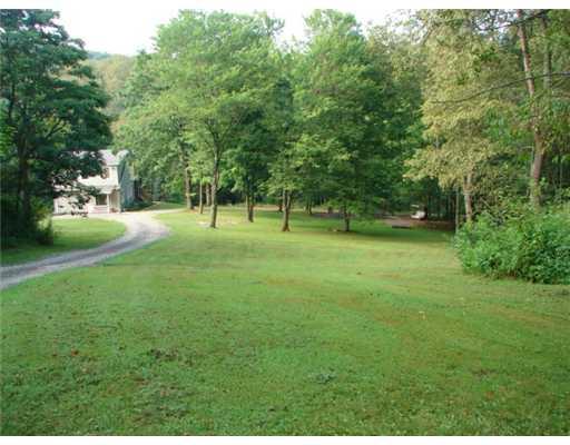 2478 Rochester Road Franklin Park, PA 15143 - Photo 4 of 18 Yard/Garden. Offers 3.84 Acres. View is from Rear Driveway. Majority of lot is wooded.