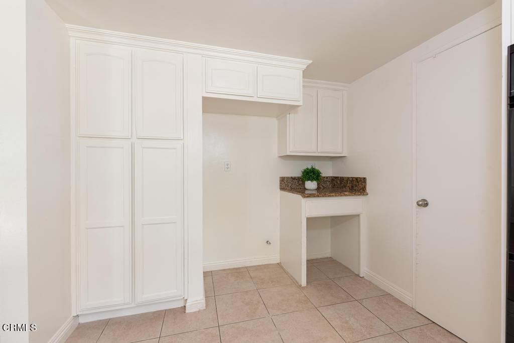 6802 Verde Ridge Road Rancho Palos Verdes, CA 90275 - Photo 12 of 46 a view of an empty room with cabinet and a window