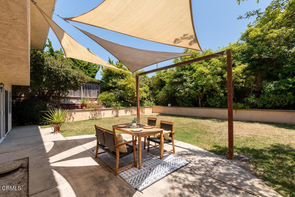 6802 Verde Ridge Road Rancho Palos Verdes, CA 90275 - Photo 16 of 46 a view of a patio with a table chairs and backyard