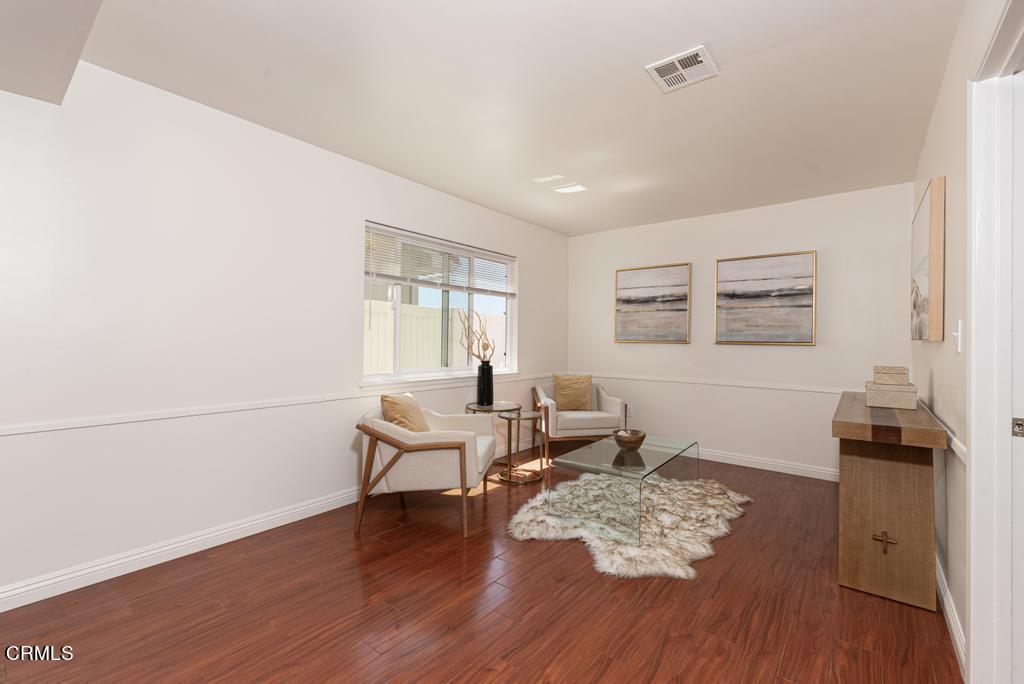 6802 Verde Ridge Road Rancho Palos Verdes, CA 90275 - Photo 20 of 46 a living room with furniture and wooden floor