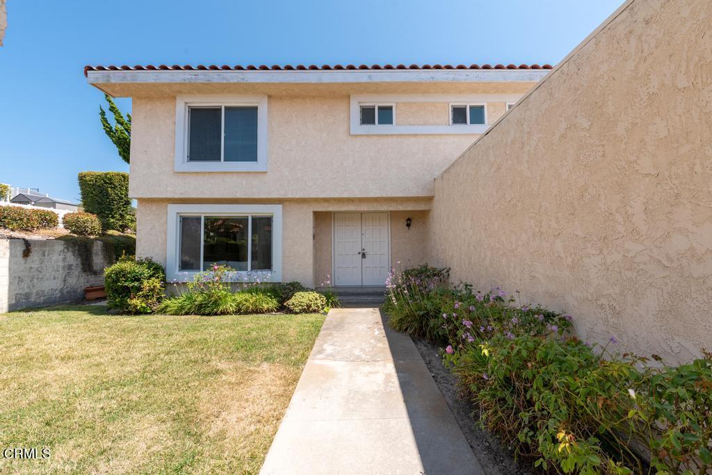 6802 Verde Ridge Road Rancho Palos Verdes, CA 90275 - Photo 3 of 46 a front view of a house with a garden