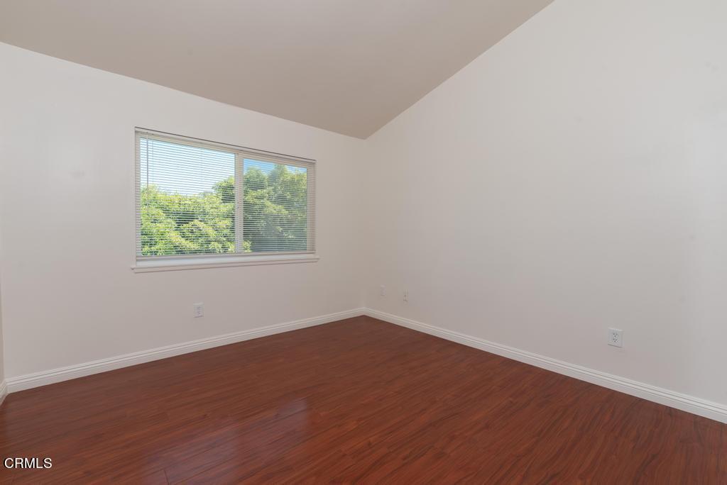 6802 Verde Ridge Road Rancho Palos Verdes, CA 90275 - Photo 31 of 46 an empty room with wooden floor and windows