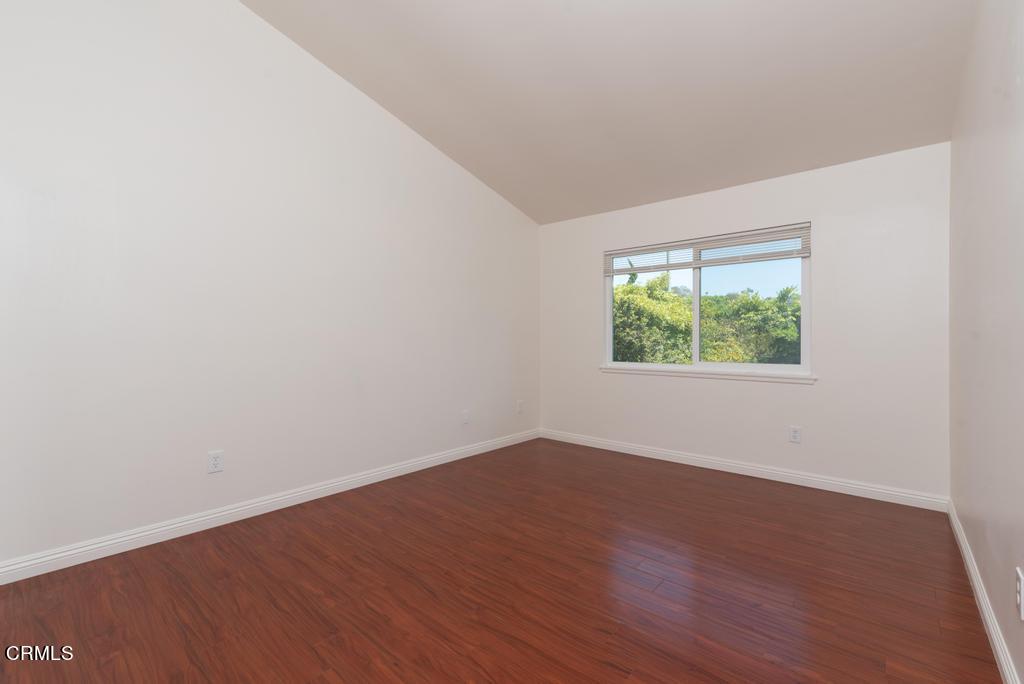 6802 Verde Ridge Road Rancho Palos Verdes, CA 90275 - Photo 32 of 46 an empty room with wooden floor and window