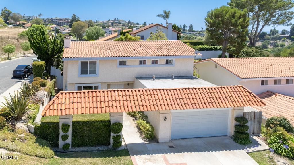 6802 Verde Ridge Road Rancho Palos Verdes, CA 90275 - Photo 43 of 46 a front view of a house with a garden