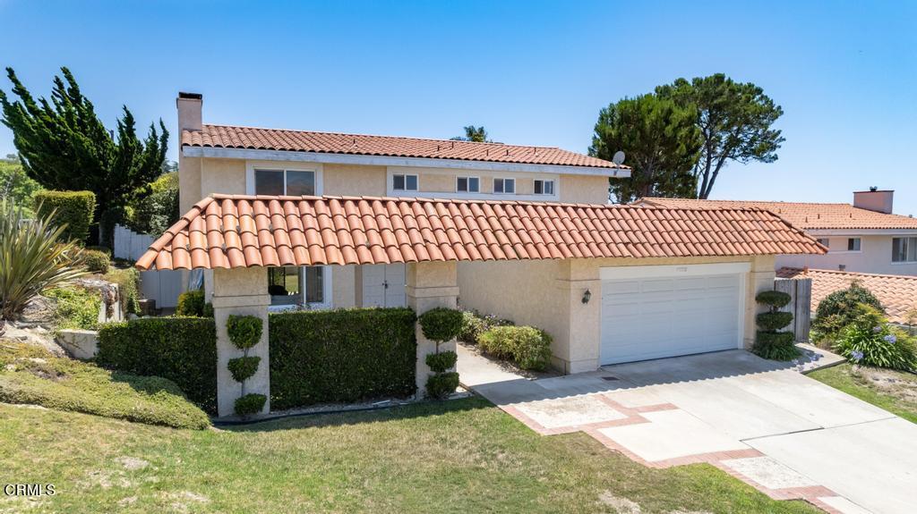 6802 Verde Ridge Road Rancho Palos Verdes, CA 90275 - Photo 44 of 46 a front view of a house with a yard