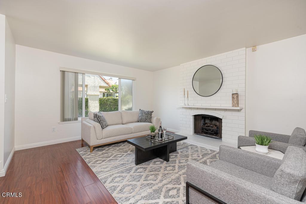 6802 Verde Ridge Road Rancho Palos Verdes, CA 90275 - Photo 7 of 46 a living room with furniture and a fireplace