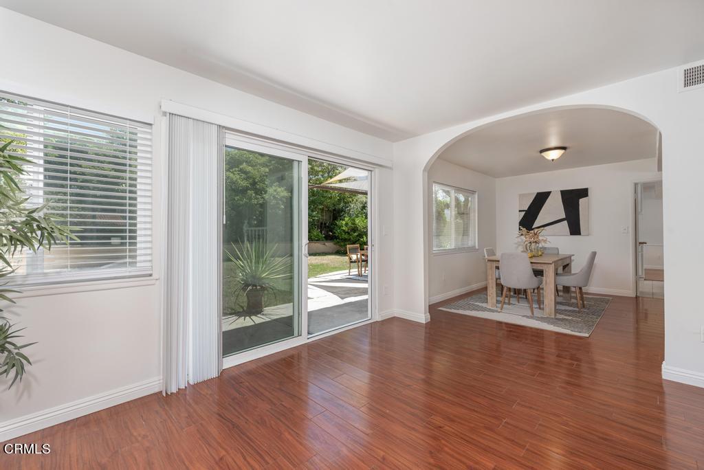 6802 Verde Ridge Road Rancho Palos Verdes, CA 90275 - Photo 9 of 46 a dining room with wooden floor and a floor to ceiling window