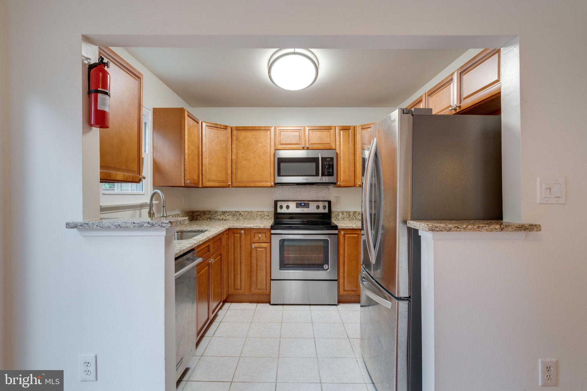 8903 Waites Way Lorton, VA 22079 - Photo 11 of 44 Kitchen with upgrade New Cabinets and New Granite