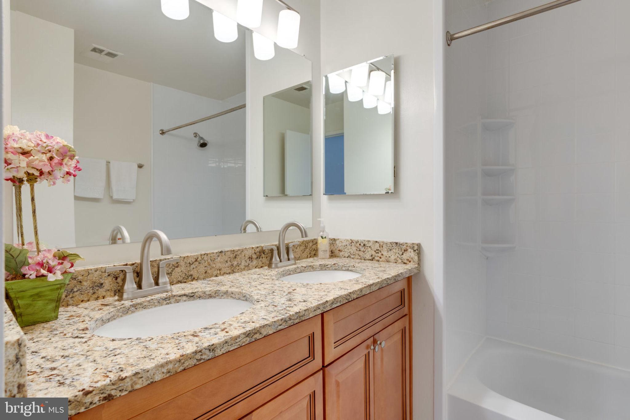 8903 Waites Way Lorton, VA 22079 - Photo 21 of 44 Upper level Hallway Full Bathroom with New vanityi