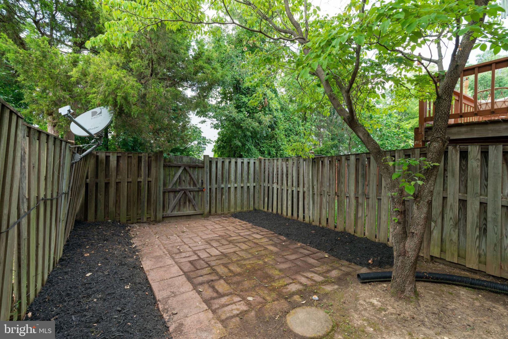 8903 Waites Way Lorton, VA 22079 - Photo 38 of 44 Back Yard with partial Brick Patio.