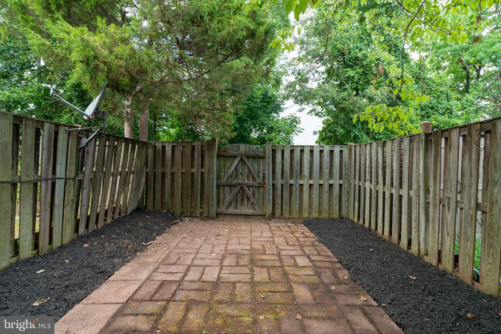 8903 Waites Way Lorton, VA 22079 - Photo 39 of 44 A view of Back yard Brick upgrade.