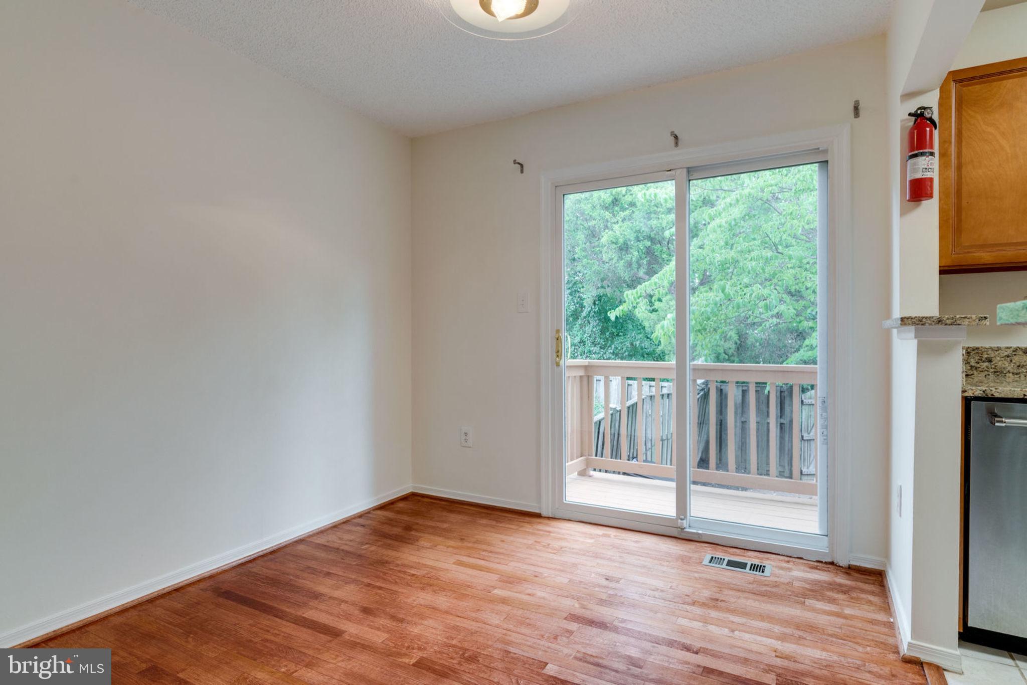 8903 Waites Way Lorton, VA 22079 - Photo 8 of 44 Dining Room open to Updated Deck.