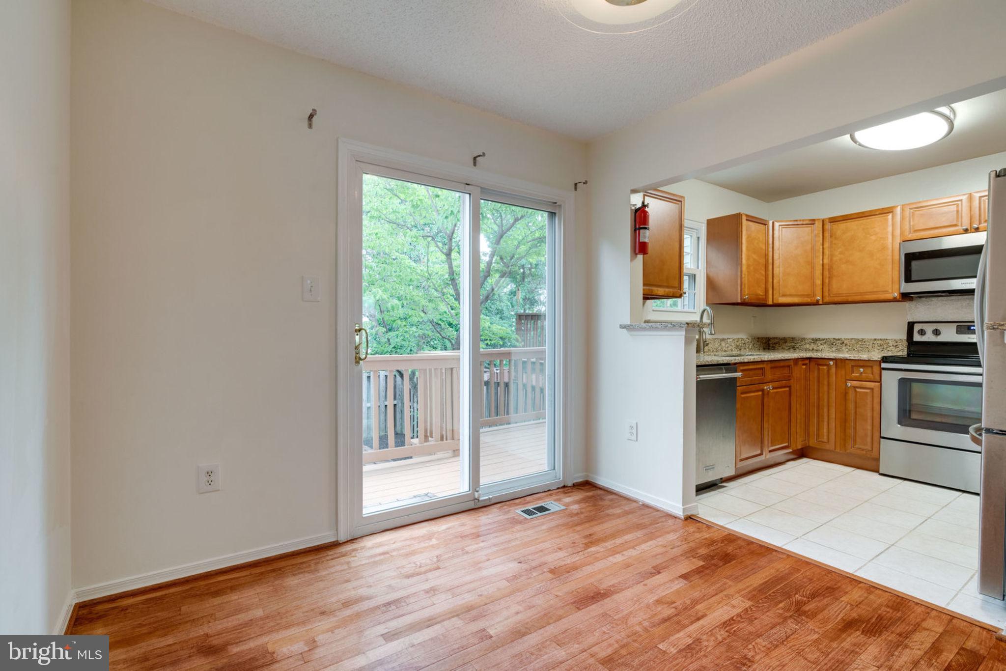 8903 Waites Way Lorton, VA 22079 - Photo 9 of 44 Kitchen open to Dining Room.~
