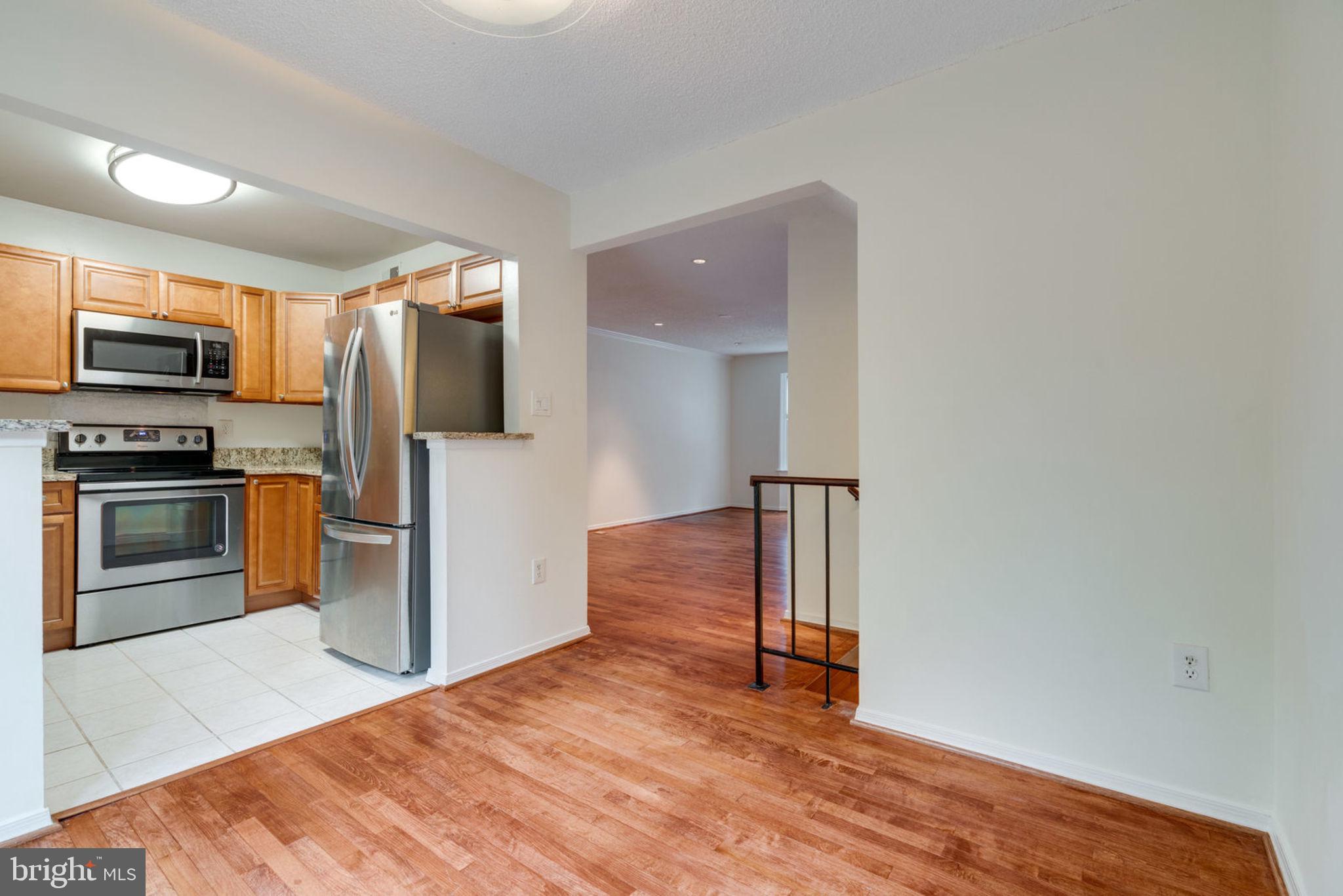 8903 Waites Way Lorton, VA 22079 - Photo 10 of 44 A view of Dining room , kitchen and part of the li