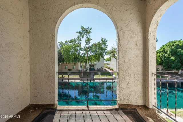 a view of a hallway with a white walls