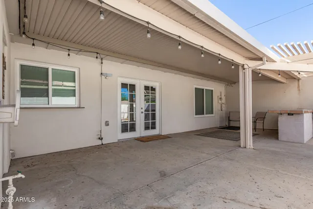 a view of an empty room with a balcony