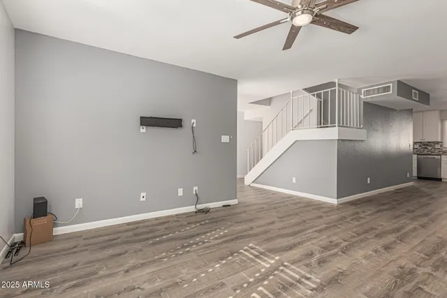 a view of a brick house with a yard