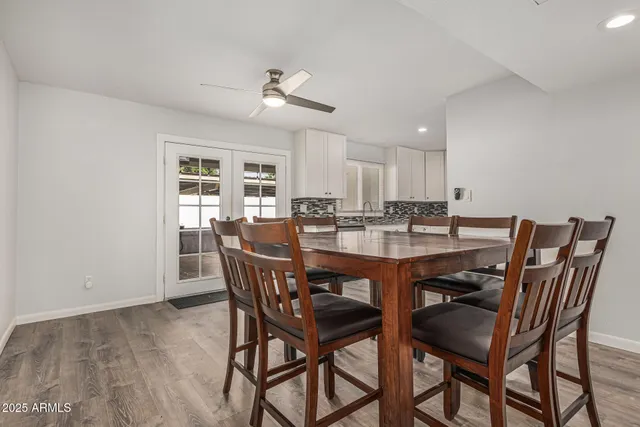 a view of kitchen and wooden floor