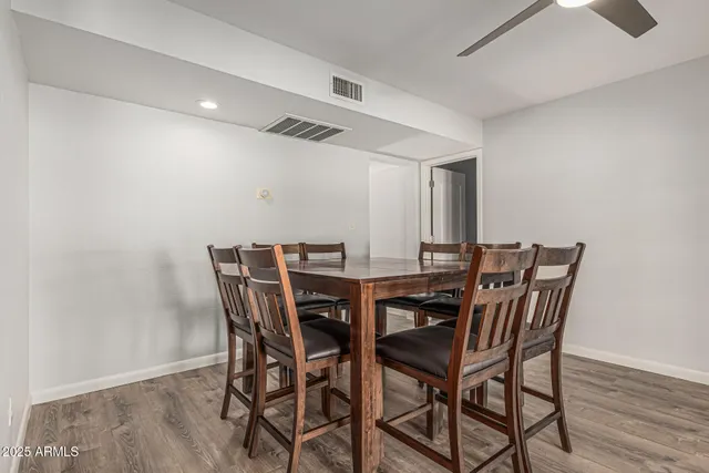 a view of a dining room with furniture