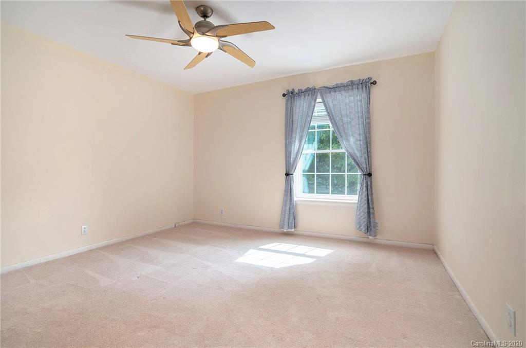 2628 Park Road, Unit H Charlotte, NC 28209 - Photo 26 of 39 a view of an empty room with a window