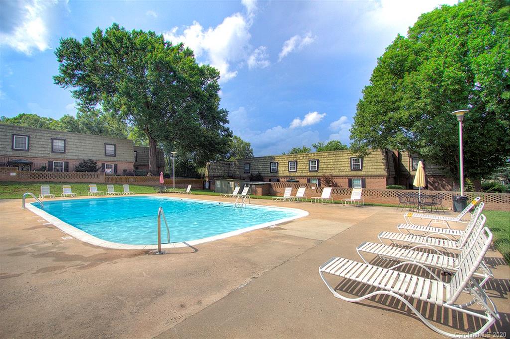 2628 Park Road, Unit H Charlotte, NC 28209 - Photo 36 of 39 a view of a swimming pool with a patio