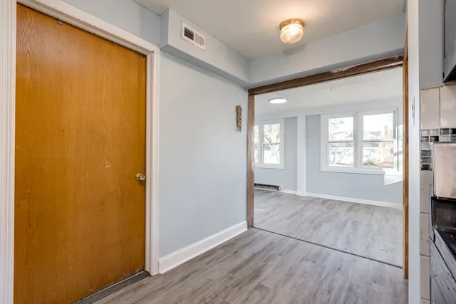 a view of livingroom with hardwood floor and window