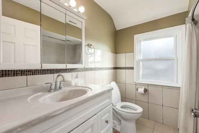 a bathroom with a sink and a toilet