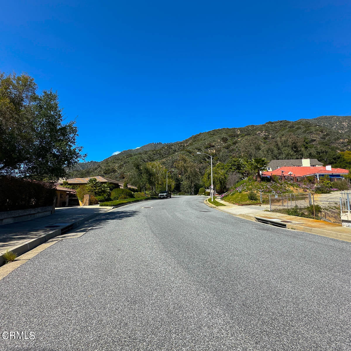 3680 Ranch Top Road Pasadena, CA 91107 - Photo 45 of 54 a view of a road with a building in the background