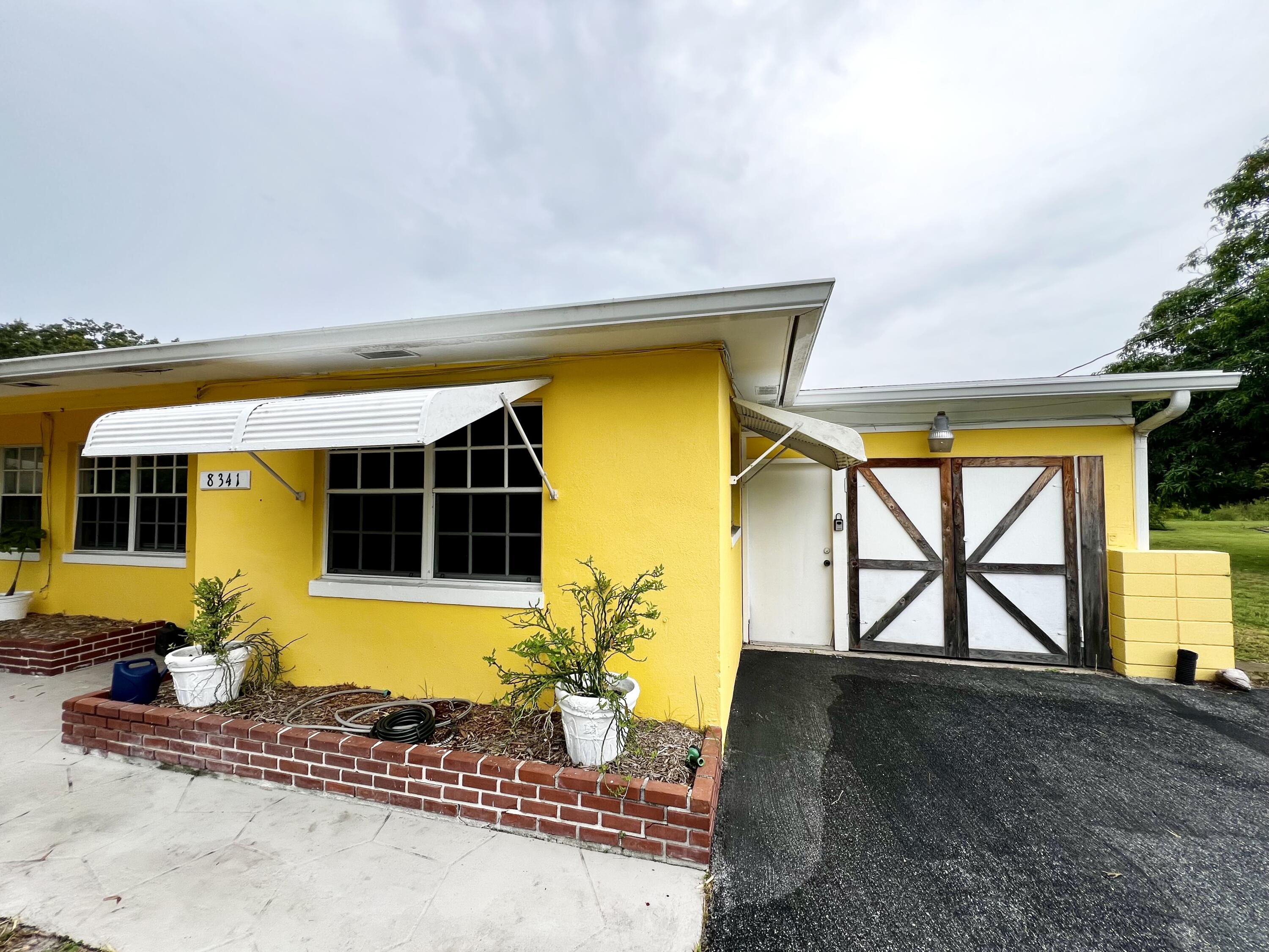 a view of a house with a swimming pool