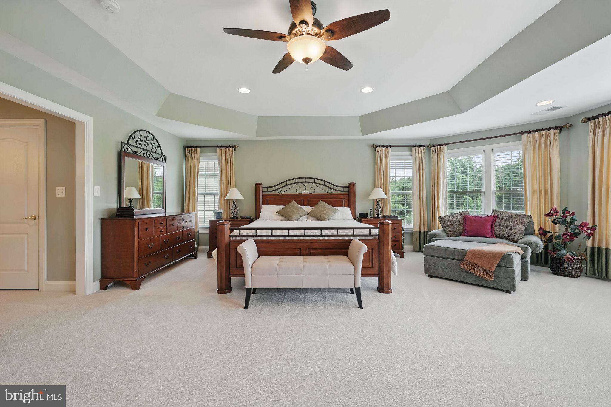 40755 Lenah Run Circle Aldie, VA 20105 - Photo 13 of 37 a bedroom with furniture and a chandelier