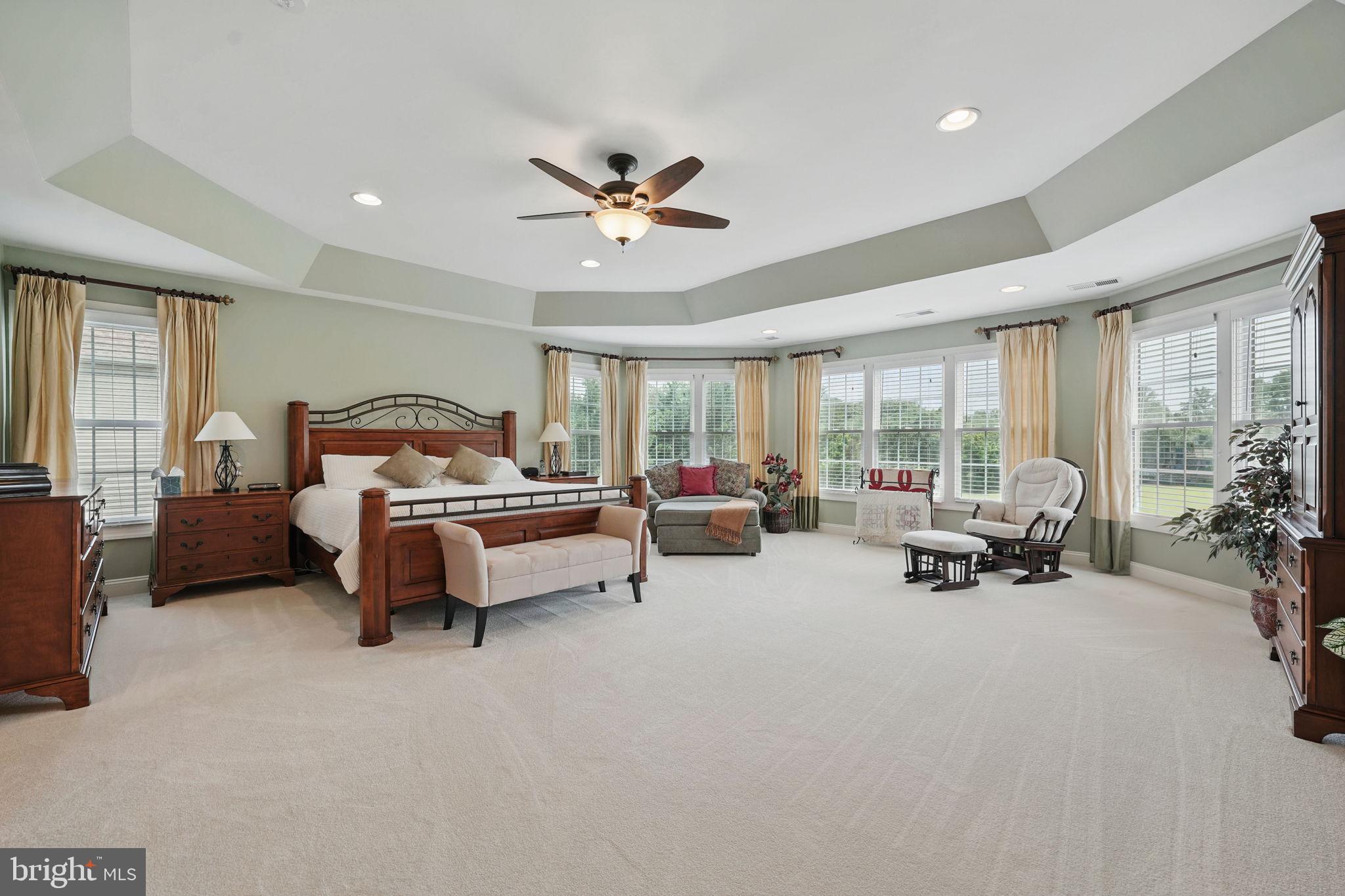40755 Lenah Run Circle Aldie, VA 20105 - Photo 14 of 37 a living room with furniture and large windows