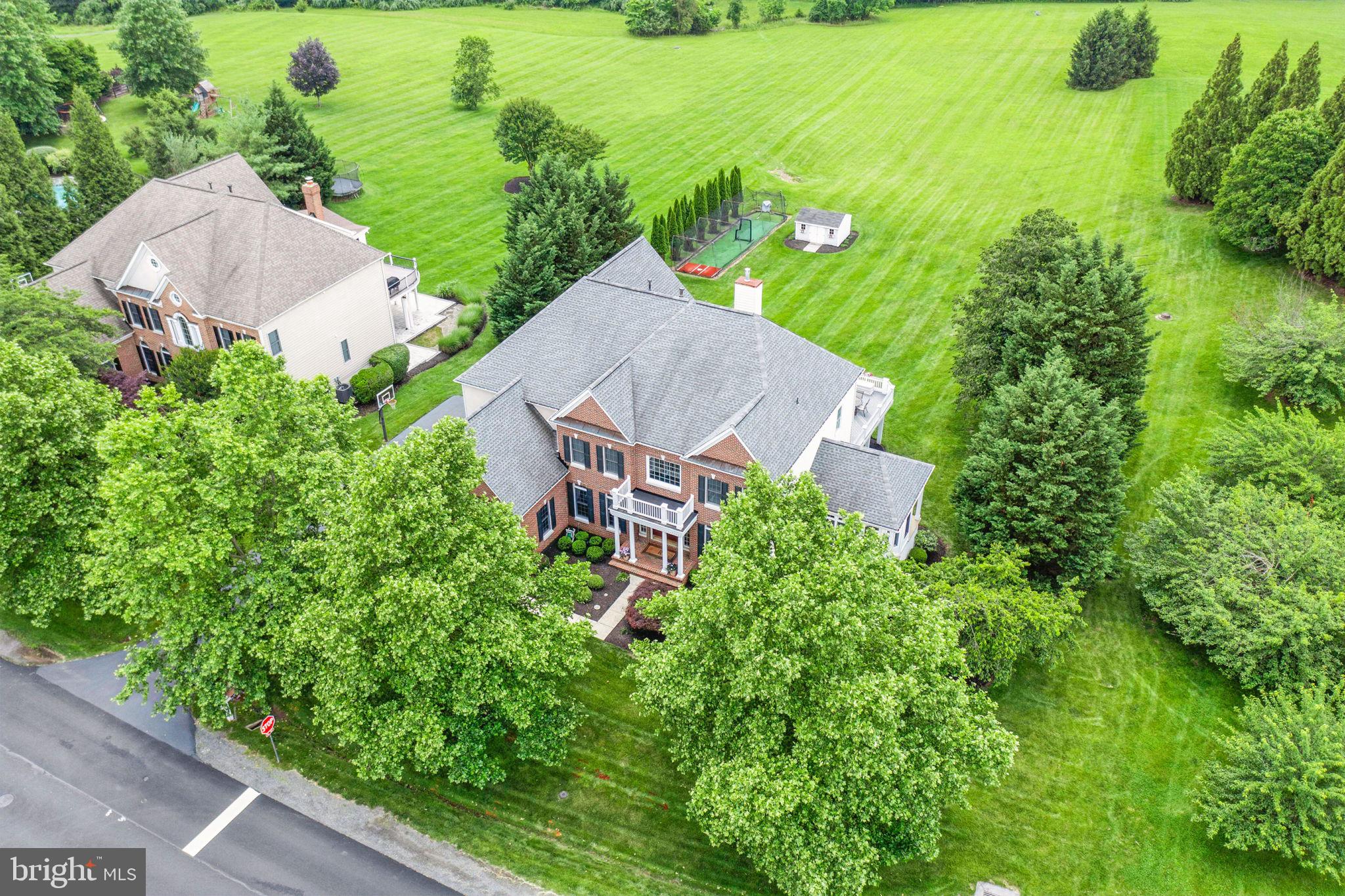 40755 Lenah Run Circle Aldie, VA 20105 - Photo 33 of 37 an aerial view of a house with a garden
