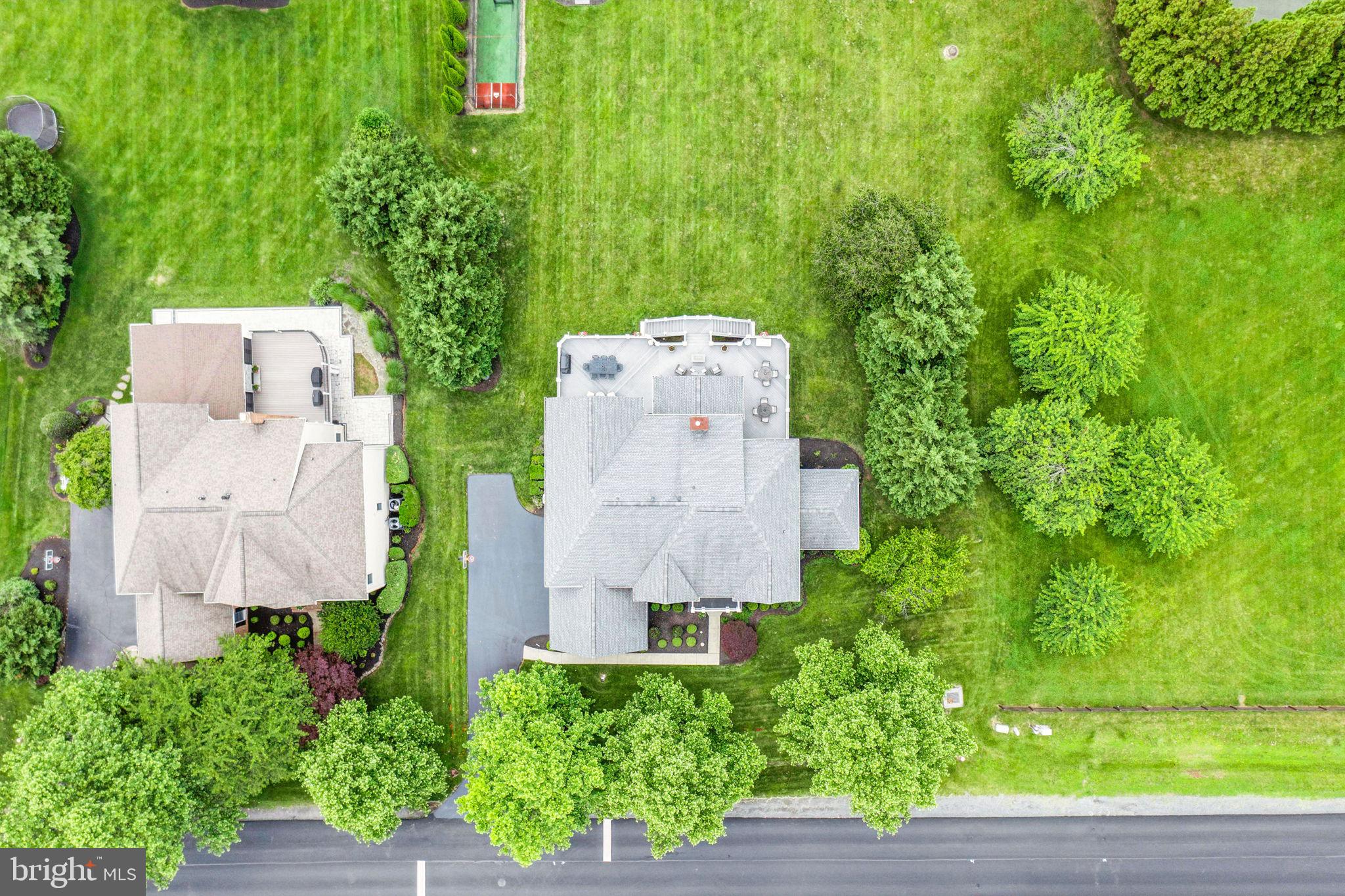 40755 Lenah Run Circle Aldie, VA 20105 - Photo 34 of 37 an aerial view of a house with a yard and a wooden fence