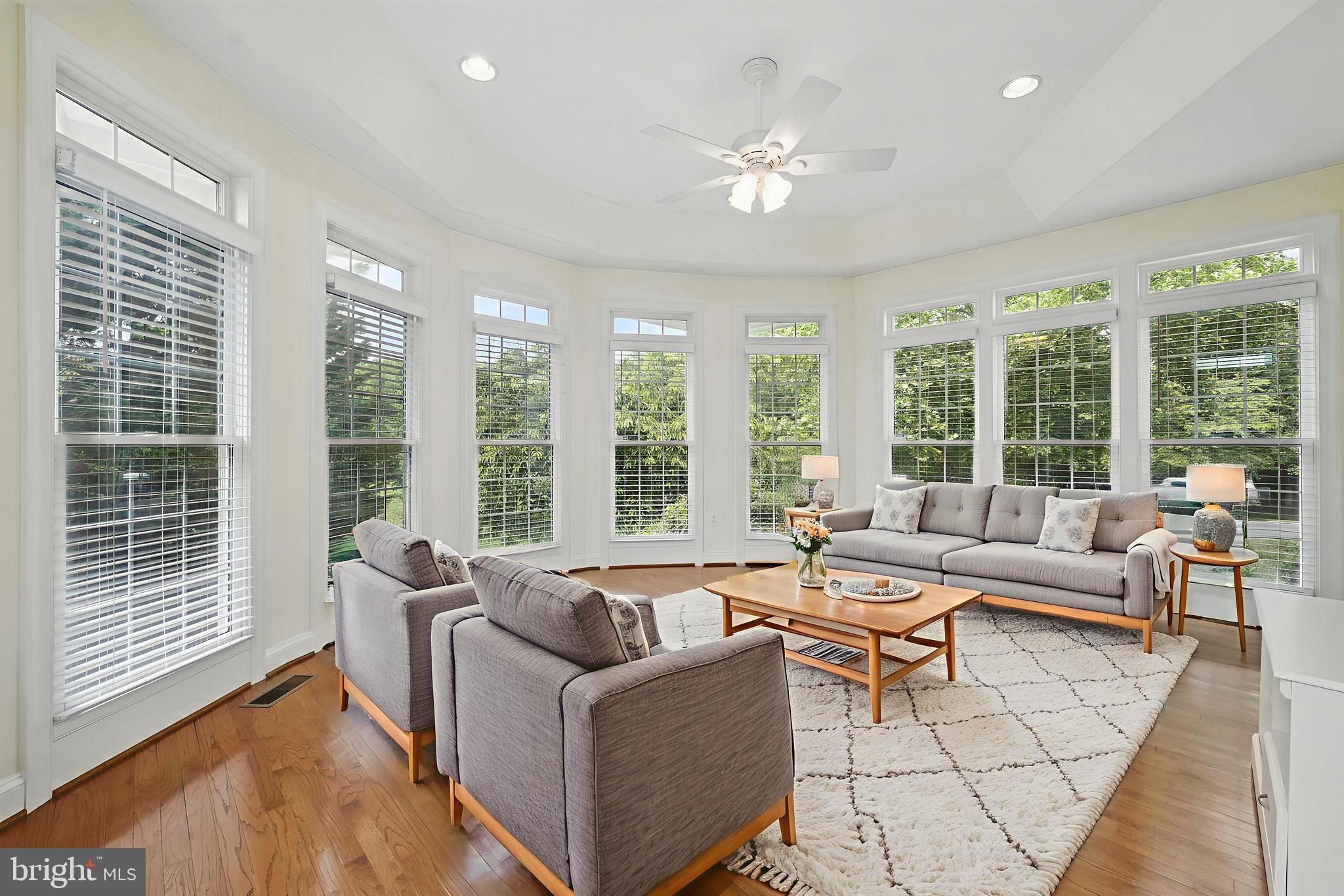 40755 Lenah Run Circle Aldie, VA 20105 - Photo 5 of 37 a living room with furniture and large windows
