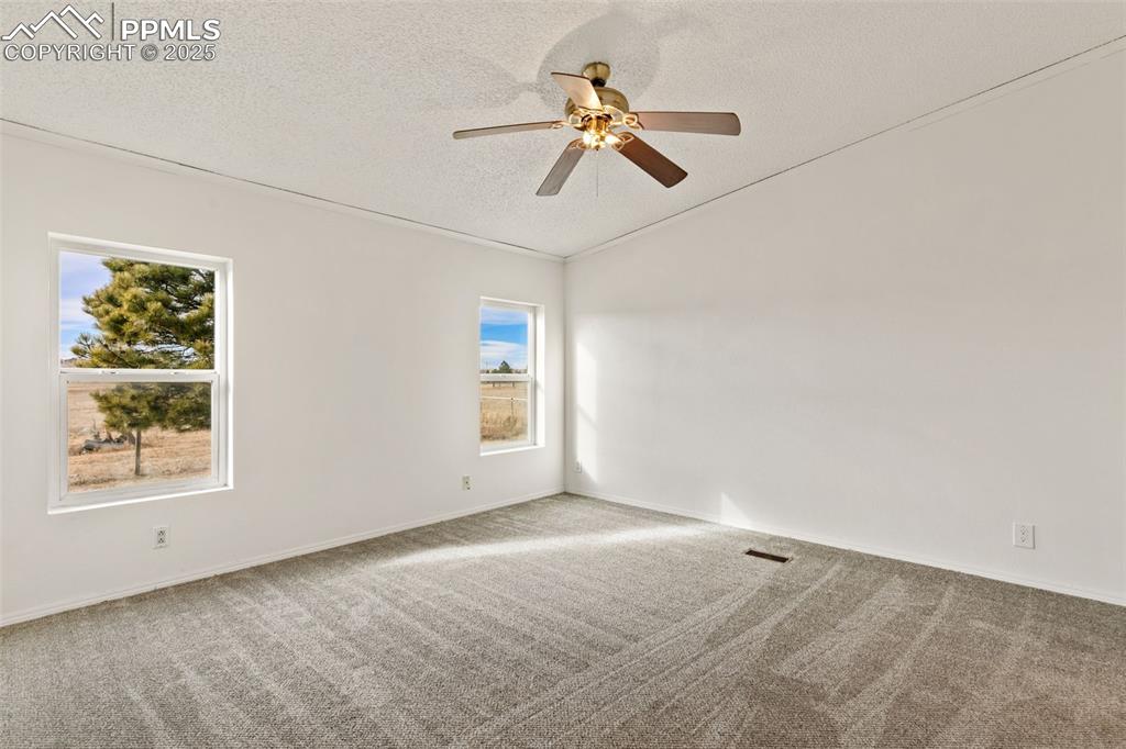 5915 West Condor Road Peyton, CO 80831 - Photo 22 of 50 Primary bedroom