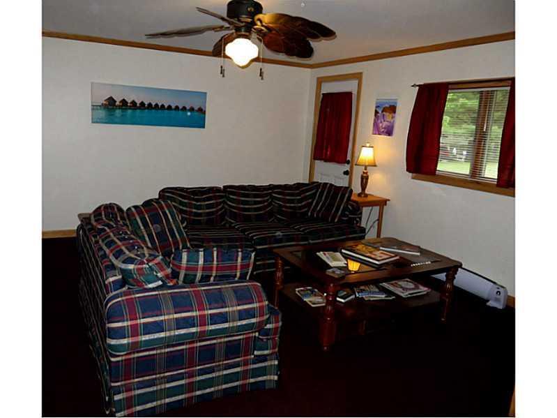 1274 Canada Road, Unit 10 Moscow, ME 04920 - Photo 11 of 27 Living Room.