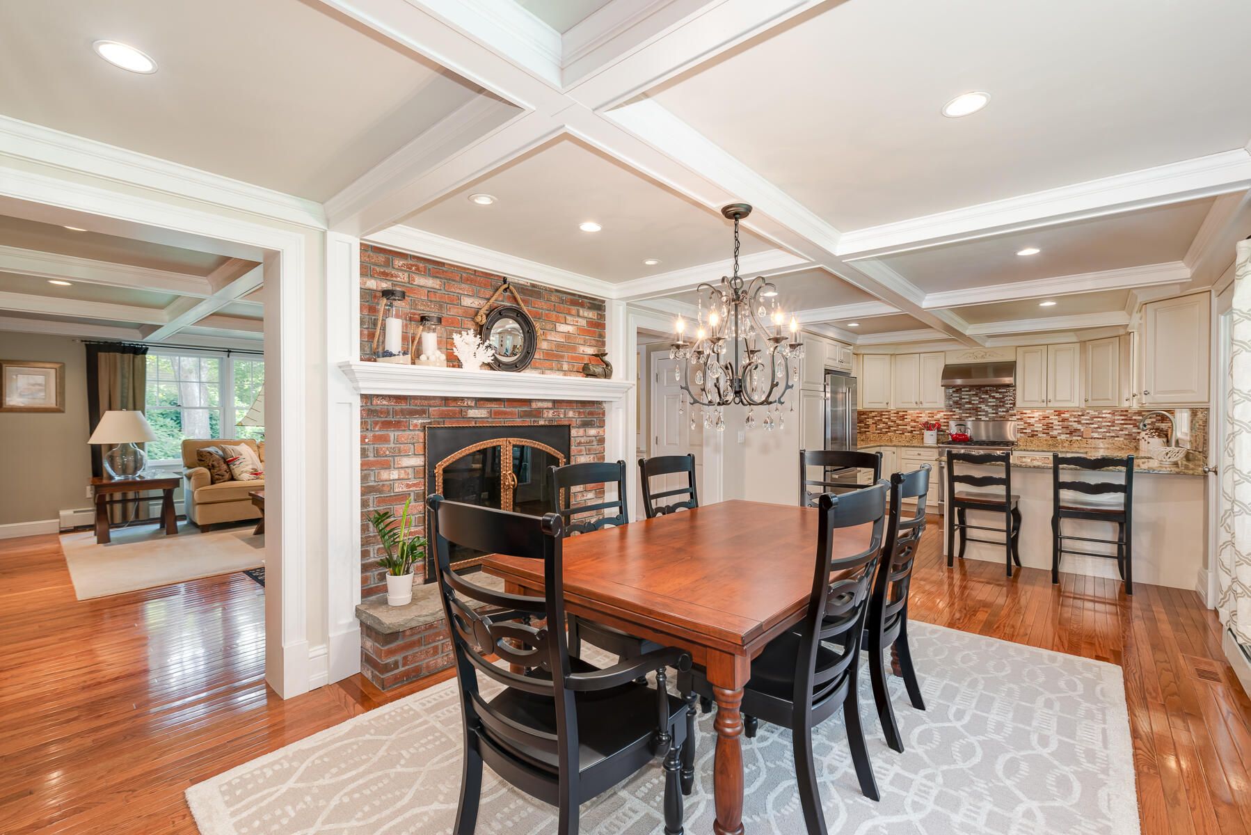 106 Scraggy Neck Road Cataumet, MA 02534 - Photo 11 of 43 a view of a dining room with furniture and wooden floor