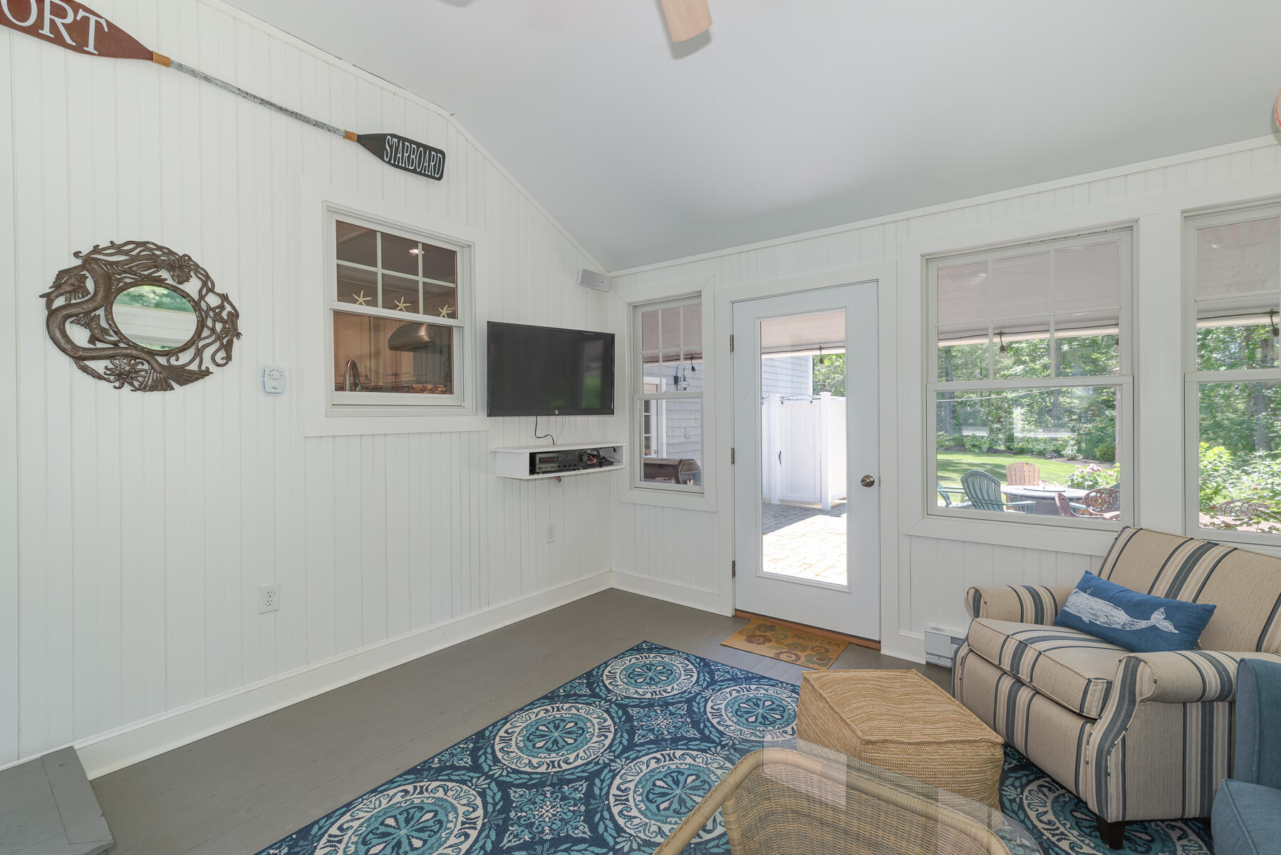 106 Scraggy Neck Road Cataumet, MA 02534 - Photo 16 of 43 a bedroom with a bed and a couch