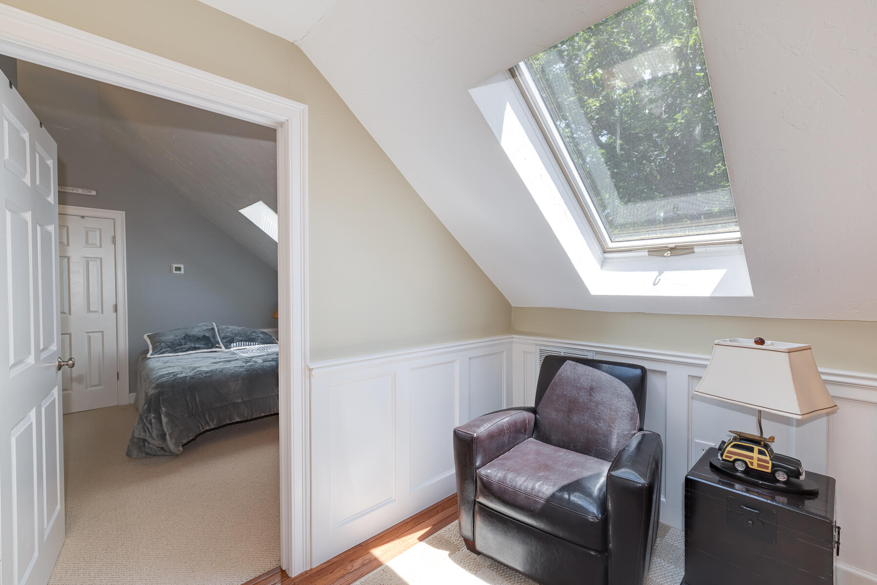 106 Scraggy Neck Road Cataumet, MA 02534 - Photo 22 of 43 a hallway with furniture and a large window