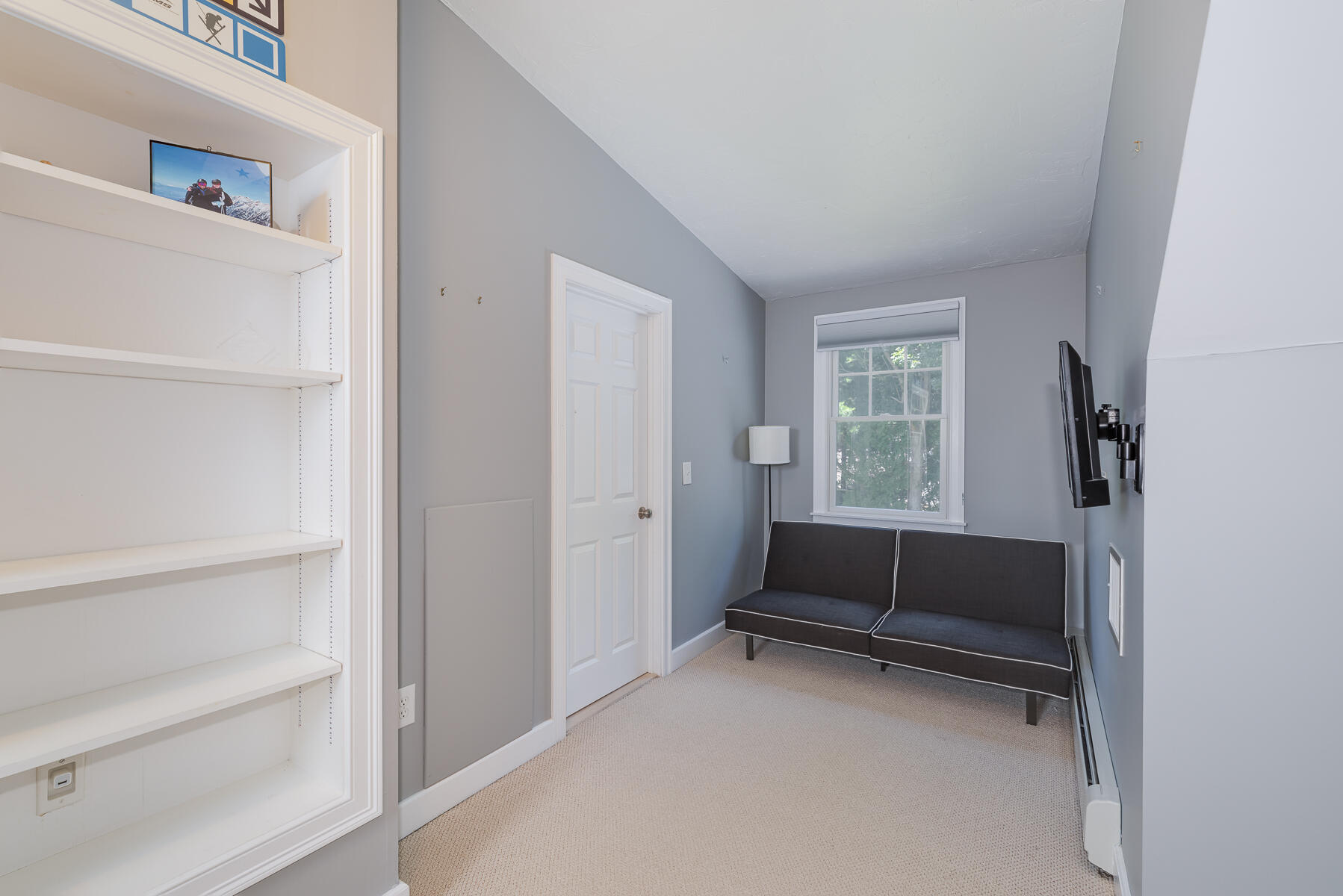 106 Scraggy Neck Road Cataumet, MA 02534 - Photo 24 of 43 a living room with furniture and a window