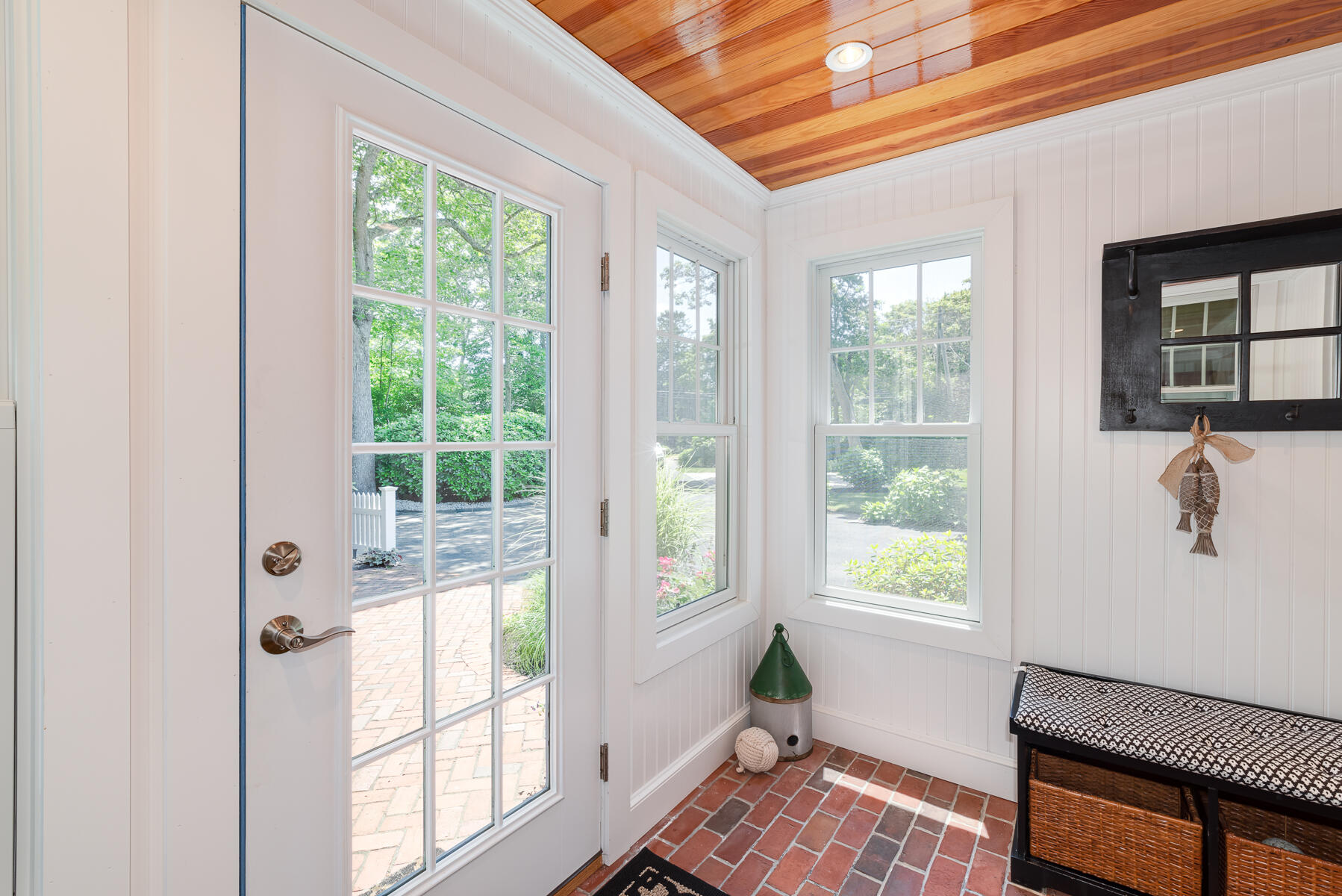 106 Scraggy Neck Road Cataumet, MA 02534 - Photo 3 of 43 a view of a bedroom with furniture and windows