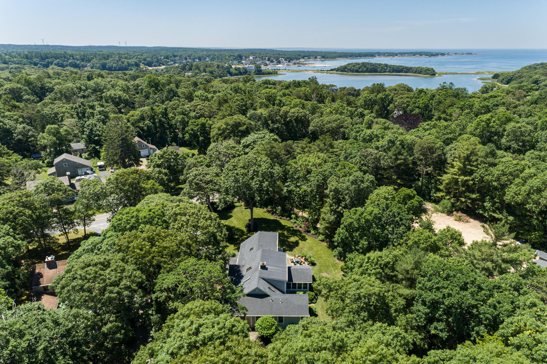 106 Scraggy Neck Road Cataumet, MA 02534 - Photo 38 of 43 an aerial view of a house with a yard