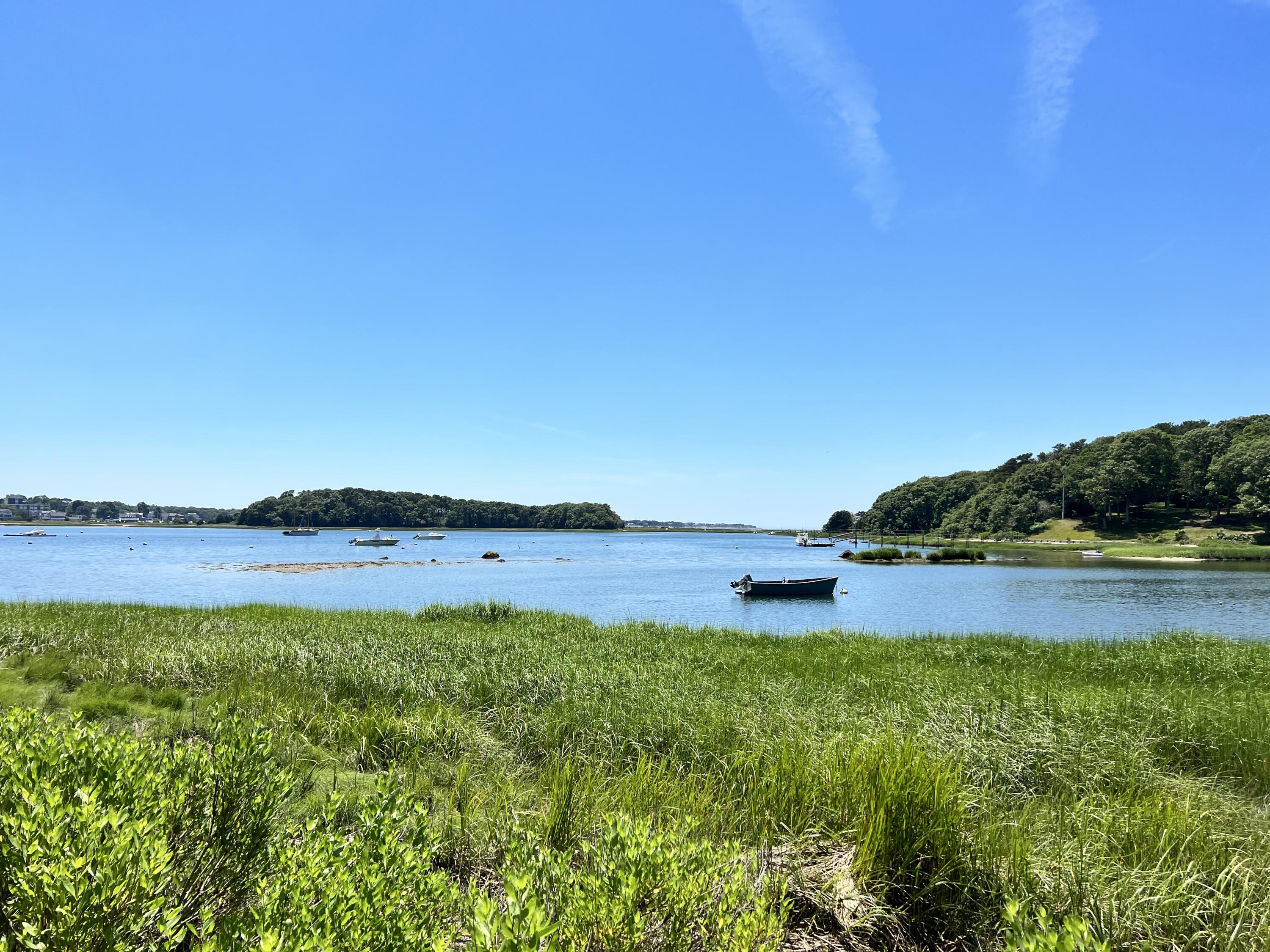 106 Scraggy Neck Road Cataumet, MA 02534 - Photo 41 of 43 a view of lake with houses