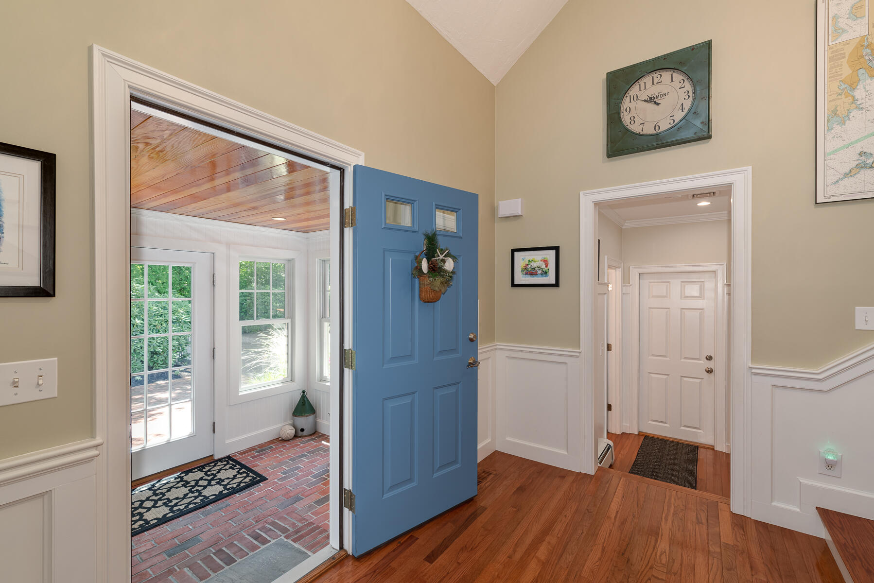 106 Scraggy Neck Road Cataumet, MA 02534 - Photo 5 of 43 a big room with wooden floor and a window